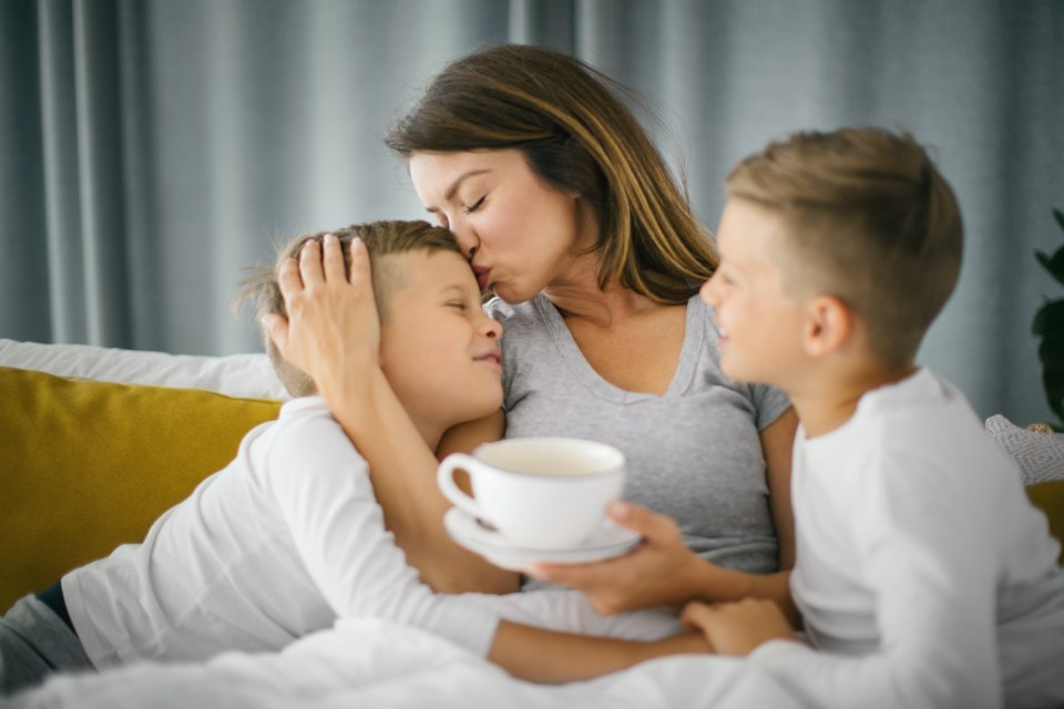 The mom said she only kisses her children on their foreheads and doesn't share their food (stock image)