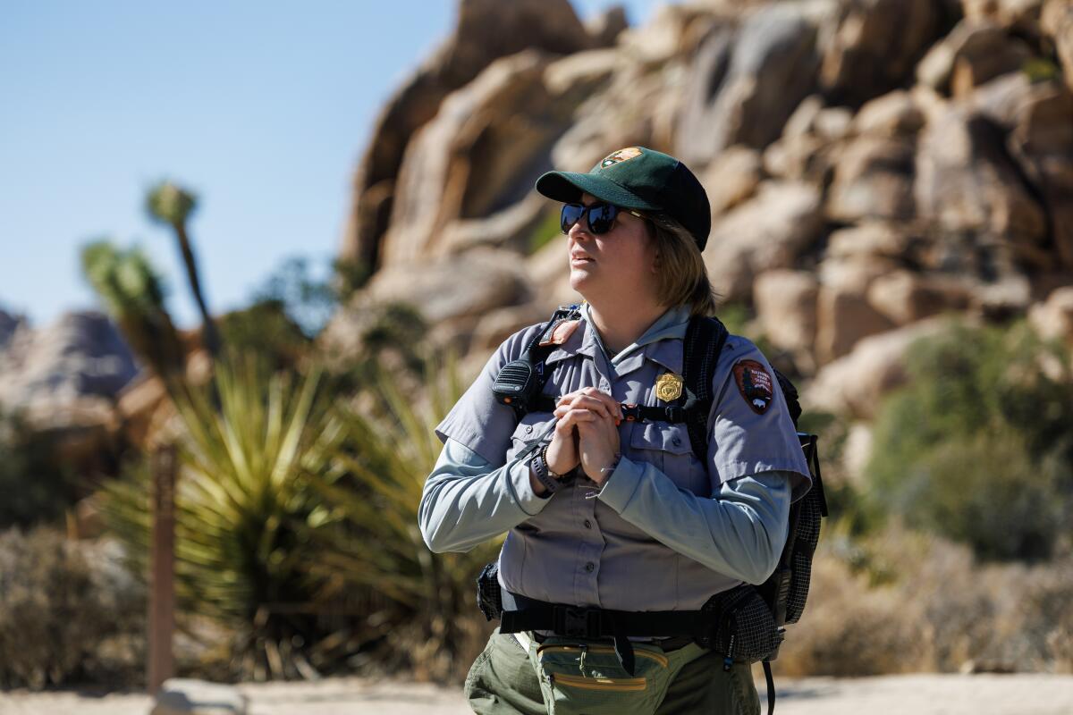 Preventative Search and Rescue Program Coordinator Anna Marini waits at the Hidden Valley trailhead.