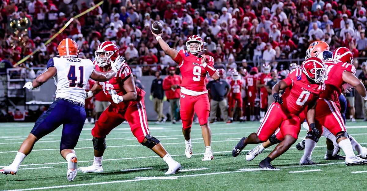 Mater Dei High quarterback Dash Beierly makes a pass from the pocket against Bishop Gorman on Friday at Santa Ana Stadium.