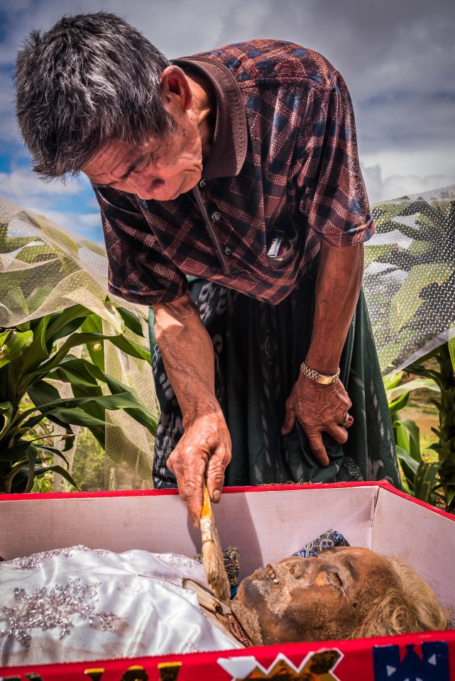 The bodies are lovingly cleaned by surviving family members