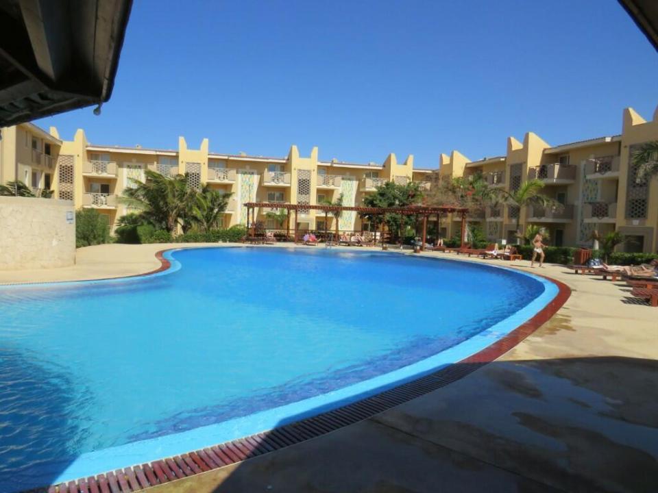 The apartment in Santa Maria in Cape Verde looks over a communal swimming pool