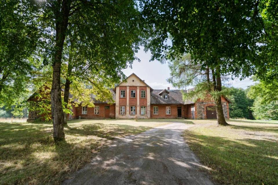 The eight bedroom manor house in Latvia is on the market for less than £45,000