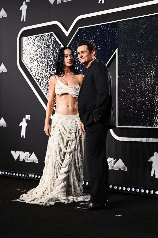 Katy Perry and Orlando Bloom on the black carpet of the MTV Video Music Awards