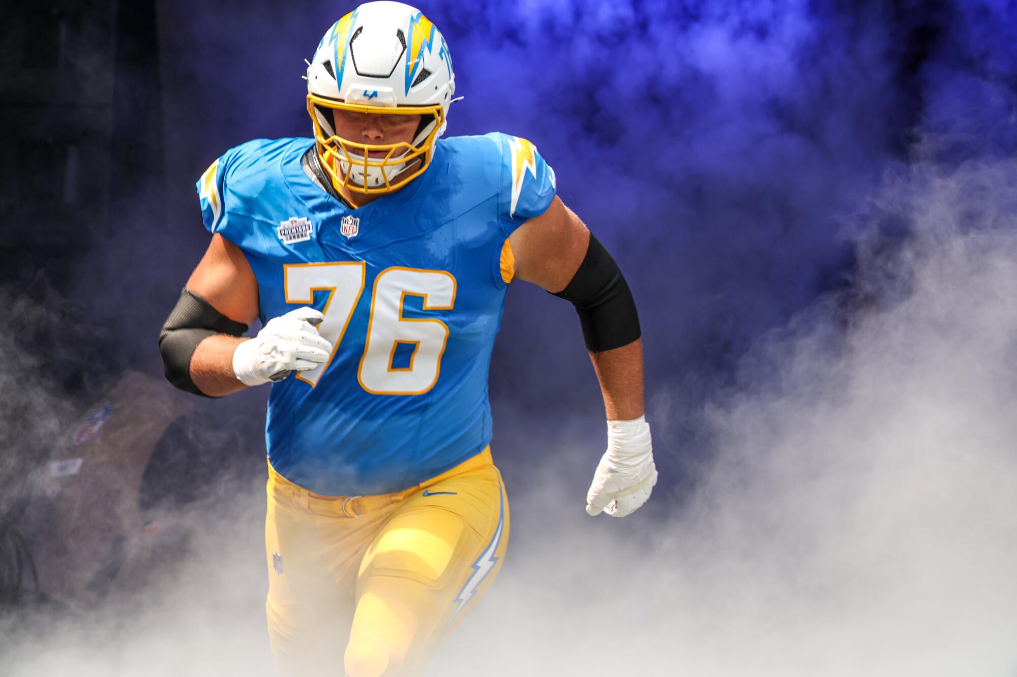  Chargers offensive tackle Joe Alt (76) takes the field for a game against the Las Vegas Raiders.