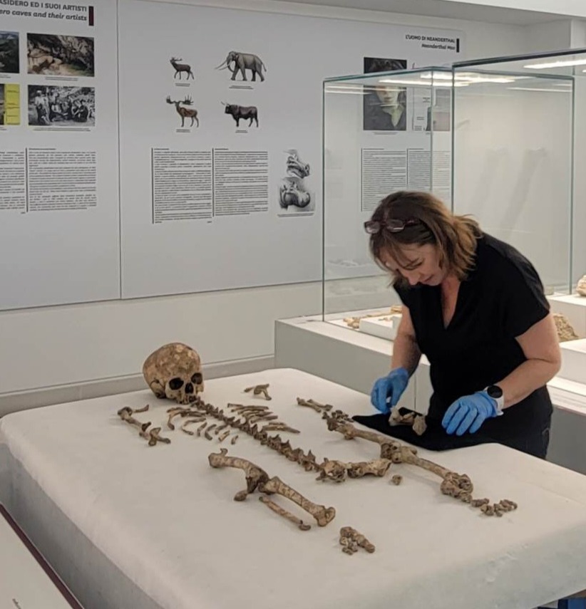 Dr Mary Lewis from the University of Reading inspecting the skeletal remains of Romito 2