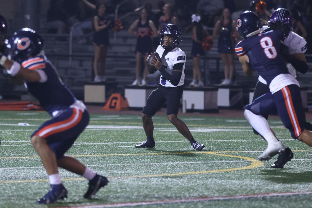 Sophomore quarterback Jaden Jefferson of Cathedral looks downfield against Chaminade.