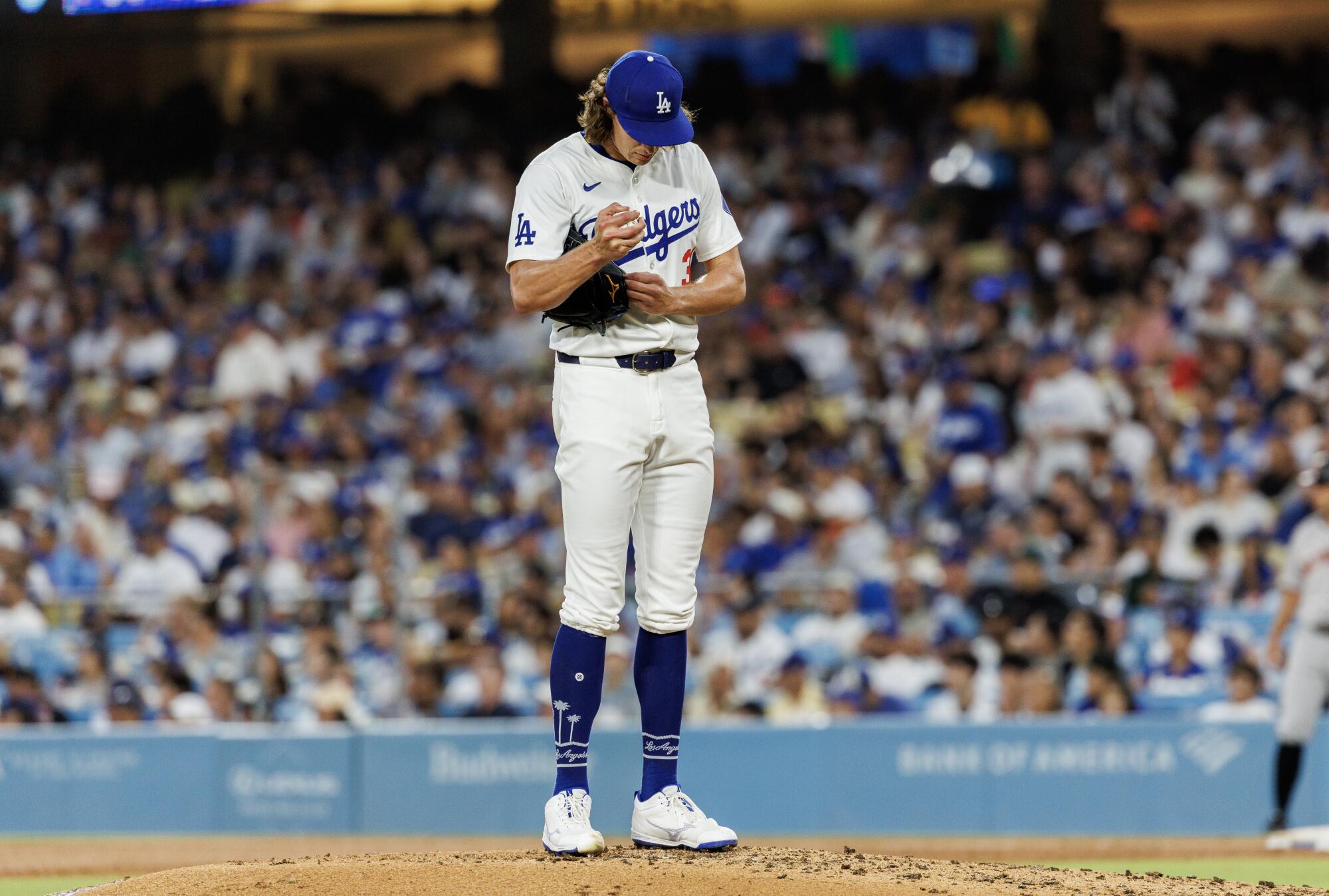 Dodgers pitcher Tyler Glasnow reacts after giving up a home run to the San Francisco Giants on July 24.