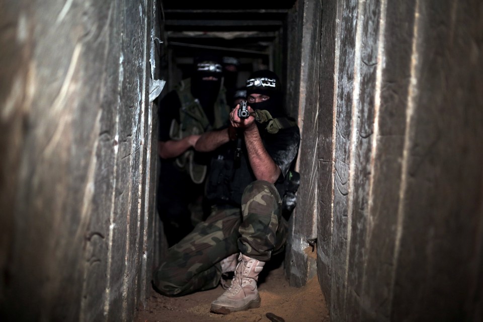 Armed fighters in one of the underground tunnels in Shujaya neighborhood of Gaza City