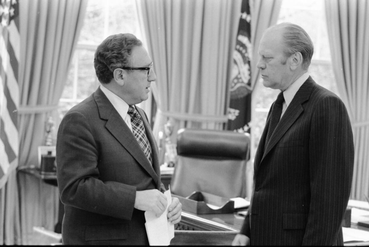 Gerald R. Ford and Secretary of State Henry Kissinger in the Oval Office.