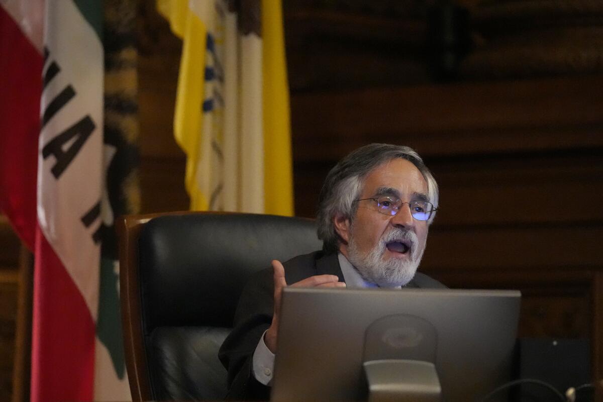 Supervisor Aaron Peskin speaks during a hearing.