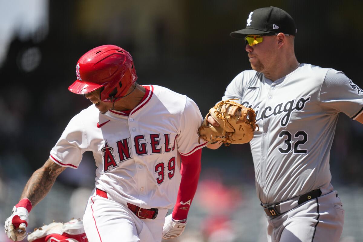 Chicago White Sox first baseman Gavin Sheets tags out Angels' Jordyn Adams at first base