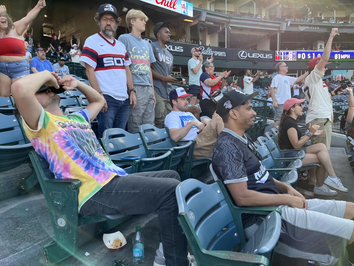 A group of Chicago White Sox look dejected.