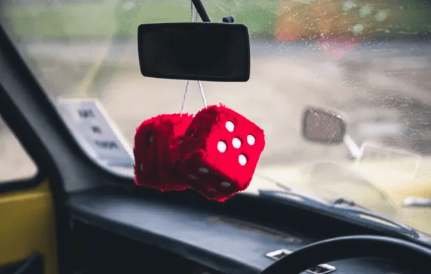 Fluffy dice and even an inflatable doll are included