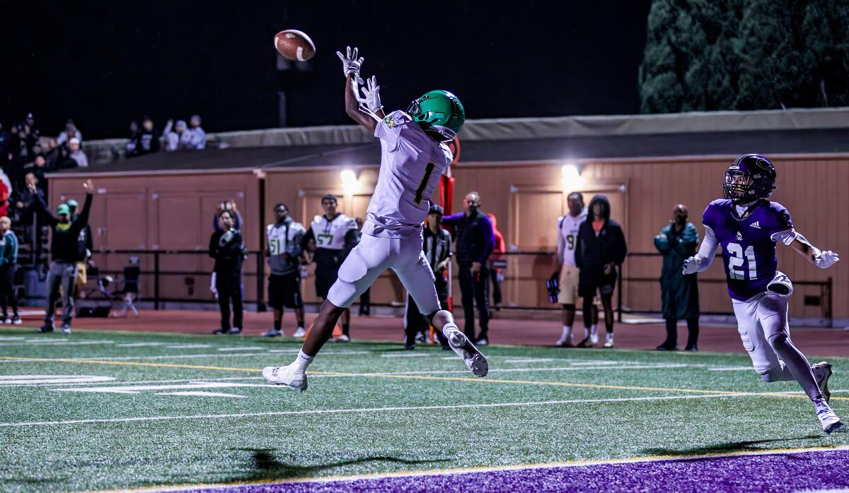 Xavier Owens of Narbonne catches the go-ahead touchdown pass in the fourth quarter against Cathedral.