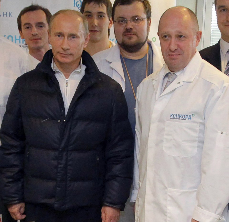 Vladimir Putin with Yevgeny Prigozhin before the mercenary leader led a failed coup against Putin