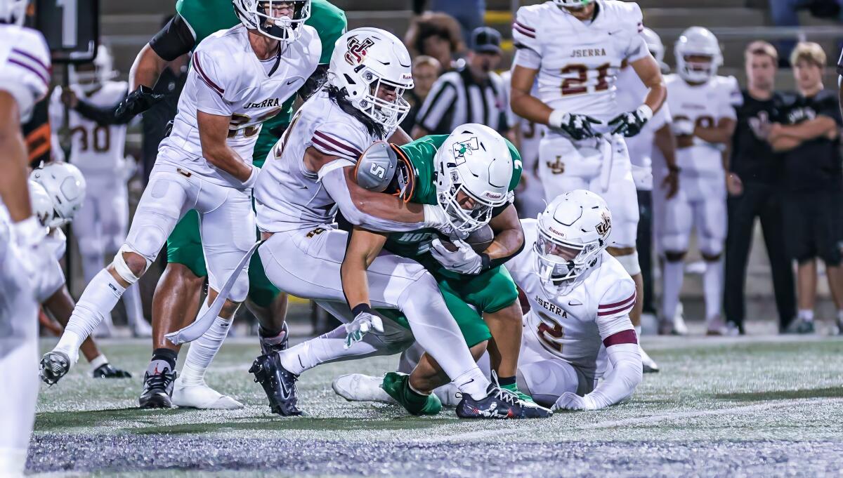 Linebacker Madden Faraimo of JSerra takes down a San Diego Lincoln ballcarrier in 28-19 victory.