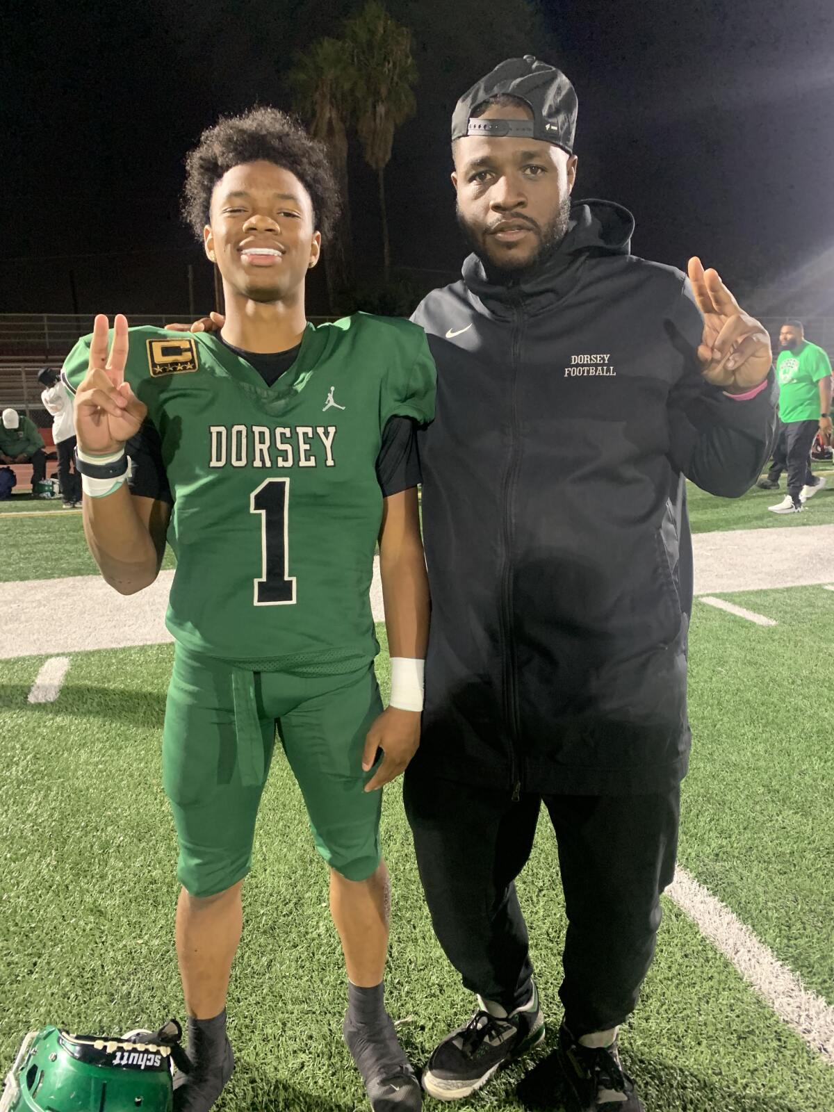 Deuce Johnson (left) and his father, Dorsey coach Stafon Johnson.