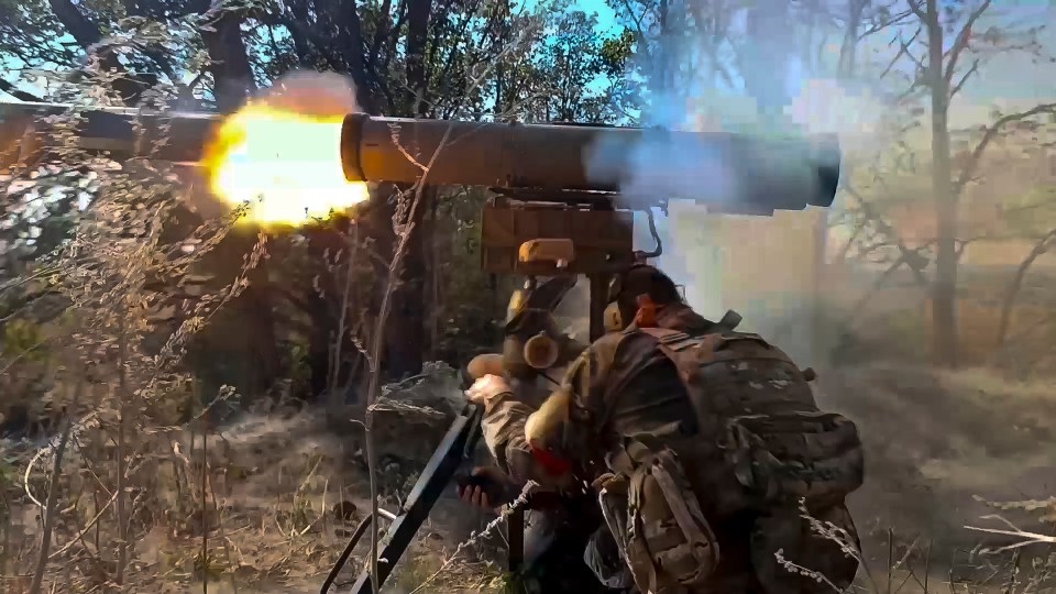 A Russian soldier fires an anti-tank missile at Ukrainian forces