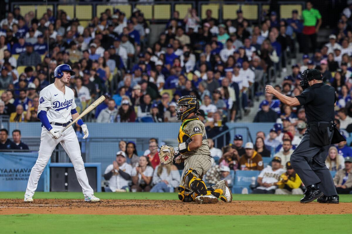 Gavin Lux disagrees with umpire Andy Fletcher on a strike call Wednesday.