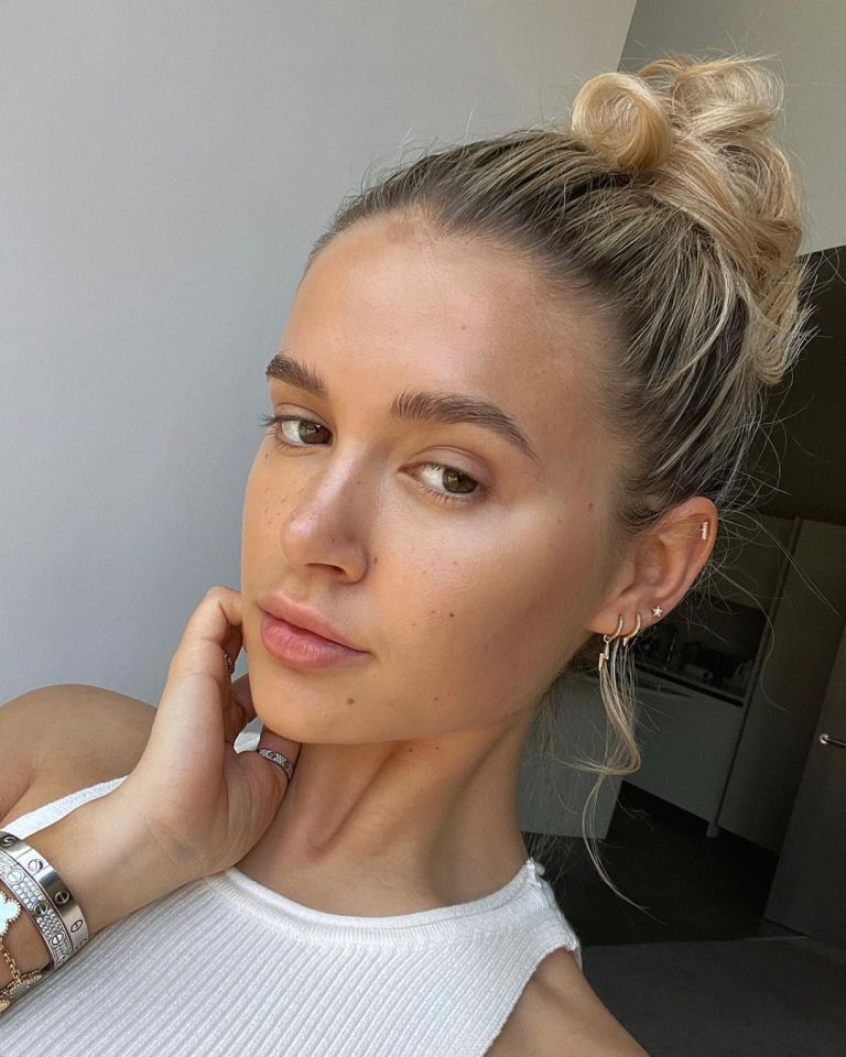 Her bun has become more slicked back since her time on Love Island, when she preferred a wispier finish