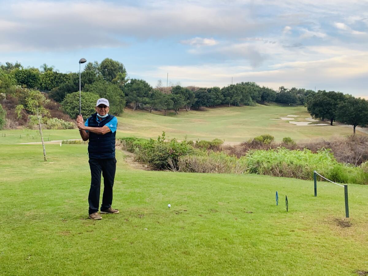 Santos Arellano plays the Coyote Hills Golf Course in Fullerton after his conversion to the game.