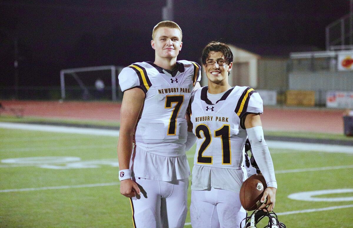 Newbury Park quarterback Brady Smigiel, left, and wide receiver Shane Rosenthal