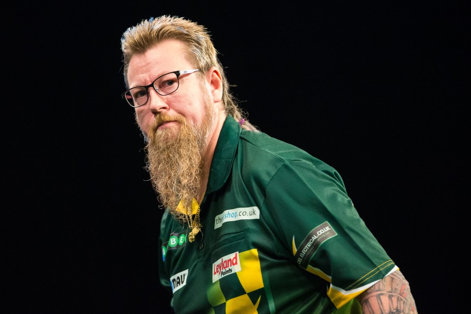 Simon Whitlock has been a darts pro for over two decades and won the 2022 PDC World Cup