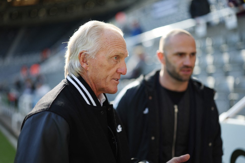 Norman, 69, was pitchside prior to the match