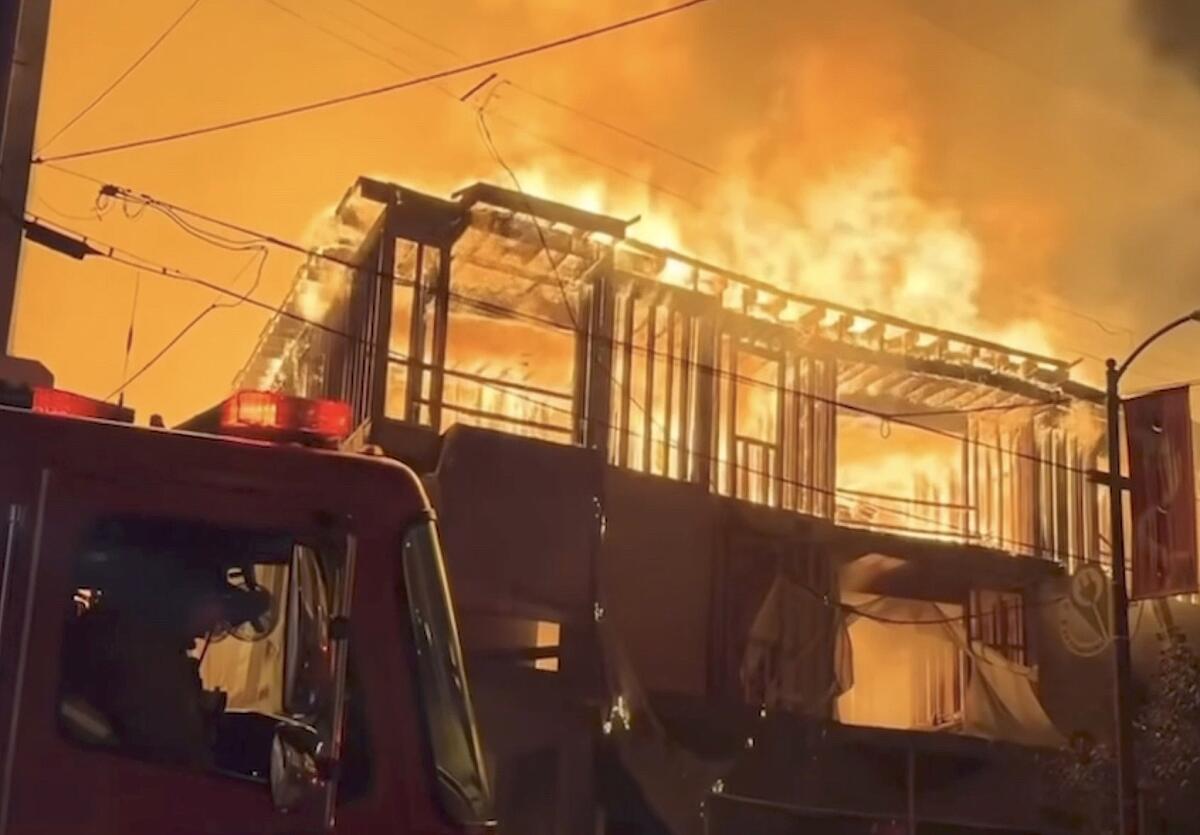 One person is in critical condition after being rescued from a raging fire in Chinatown.