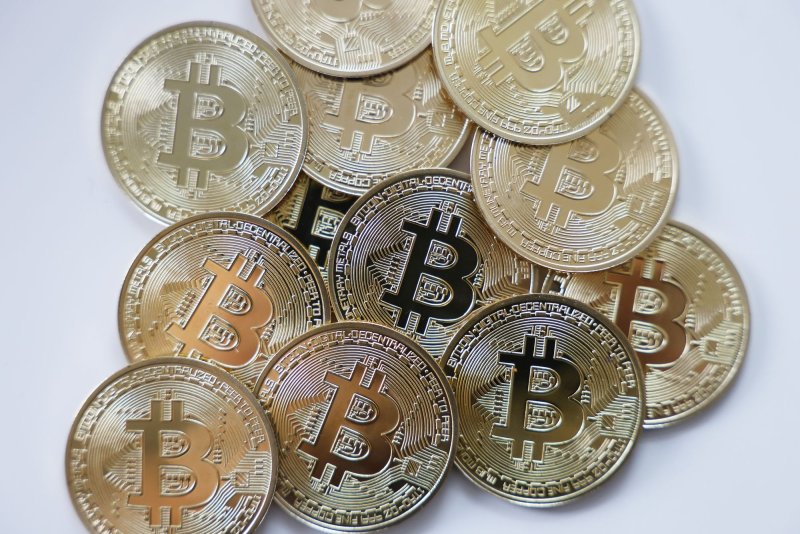 Charges filed against two men by the Department of Justice allege they stole more than 4,100 Bitcoin from a victim in Washington D.C. last month, making their take worth more than $230 million. File Photo by John Angelillo/UPI