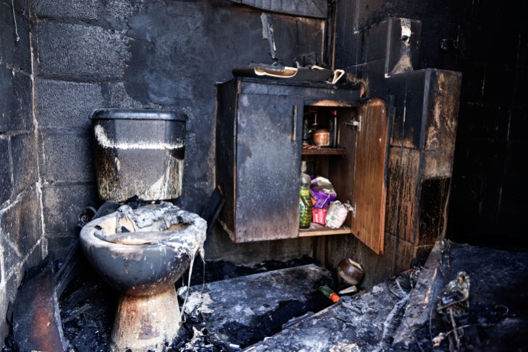 A bathroom inside a home destroyed by wildfire