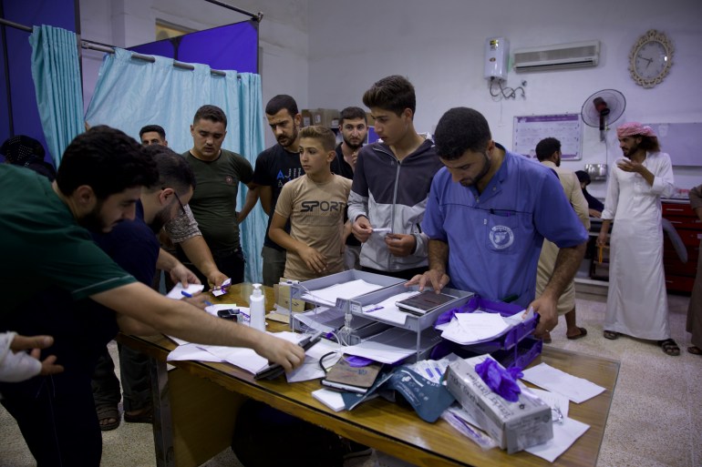 Hospital staff and patients around a table