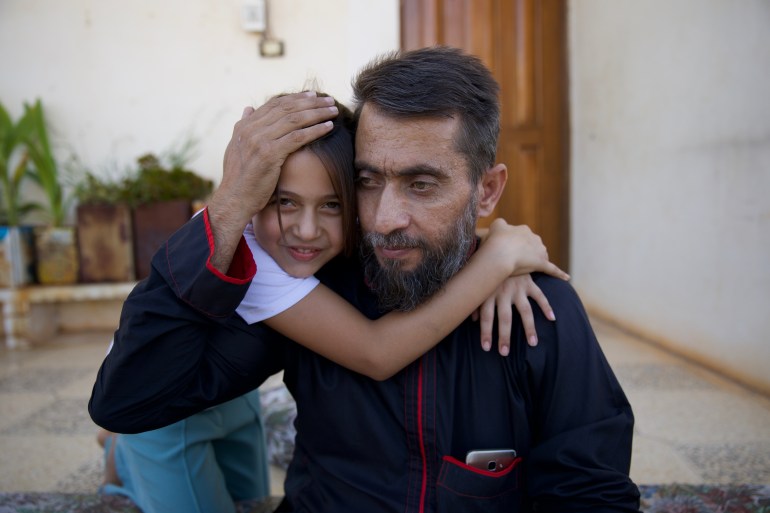 Ayman al-Khayal and his daughter Madiha