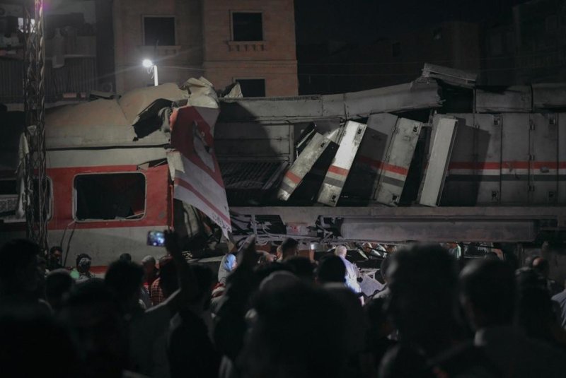 At least three were killed and at least 40 injured when two trains collided in Egypt's Zigazag city in the Nile Delta area Saturday. Photo by Ahmed Elbagra/EPA-EFE