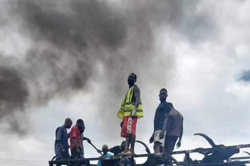 At least 48 people were killed and 50 cattle were burned alive in a head on collision between a fuel tanker and another truck in Nigeria Sunday. Photo courtesy of the office of Farmer Mohammed Umaru Bago, Niger State governor.