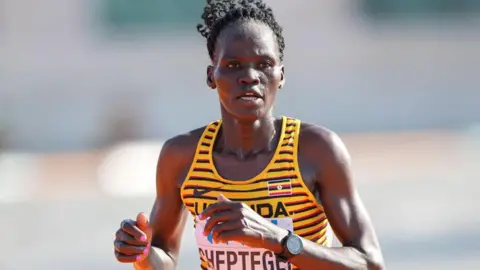 Alamy Rebecca Cheptegei participating in the marathon at the World Athletics Championships in Budapest 2023