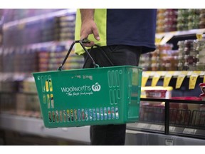 The Woolworths Group Ltd. branding on a shopping basket at their grocery store in Sydney, Australia, on Monday, Aug. 21, 2023. Woolworths is scheduled to release earnings results on Aug. 23. Photographer: Brent Lewin/Bloomberg