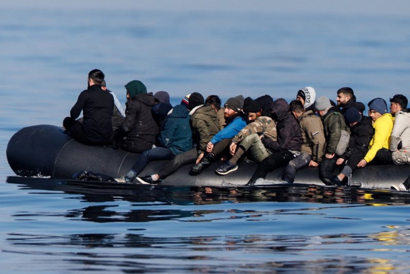 Around 60 migrants cross the English Channel on a small boat, on March 6. Eight migrants attempting to cross the English Channel from France died early Sunday, officials said. File photo by OlgaAkman/EPA-EF