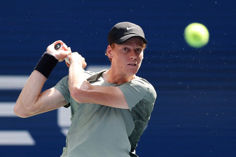 NEW YORK, NEW YORK - AUGUST 31: Jannik Sinner of Italy returns a shot against Christopher O'Connell of Australia during their Men's Singles Third Round match on Day Six of the 2024 US Open at USTA Billie Jean King National Tennis Center on August 31, 2024 in the Flushing neighborhood of the Queens borough of New York City. Mike Stobe/Getty Images/AFP (Photo by Mike Stobe / GETTY IMAGES NORTH AMERICA / Getty Images via AFP)