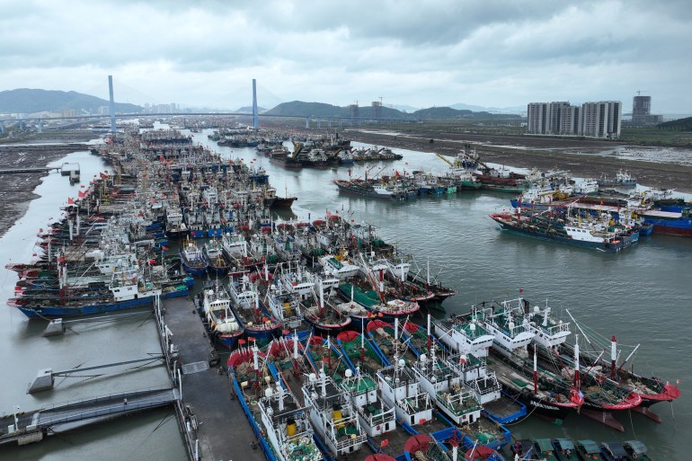 Fishing boats shelter in the port in Zhoushan, in China’s easter Zhejiang province ahead of the arrival of Typhoon Bebinca on September 15, 2024. (Photo by AFP) / CHINA OUT