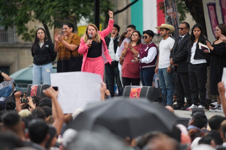 Justice Minister Loretta Ortiz speaks during a rally