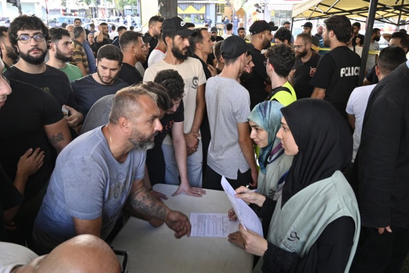 People lined up to donate blood after pager explosions targeting Hezbollah in Lebanon killed at least 12 people, including two children, and injured thousands. Photo by Wael Hamzeh/EPA-EFE