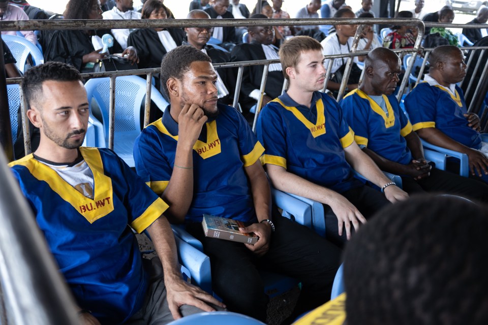 US national Taylor Thomson (C) and some of the defendants on trial for ‘coup attempt’ sits in the military court to hear their verdict