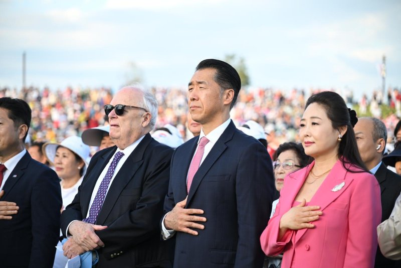 Hyun Jin Preston Moon, center, is pictured during the 2024 Korean Dream Grand March for a Unified Korea.