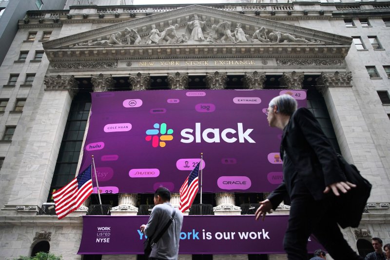 The logo for Slack hangs outside of the New York Stock Exchange on Wall Street on June 20, 2019. Disney said it will stop using Slack by the end of its first fiscal quarter. File Photo by John Angelillo/UPI