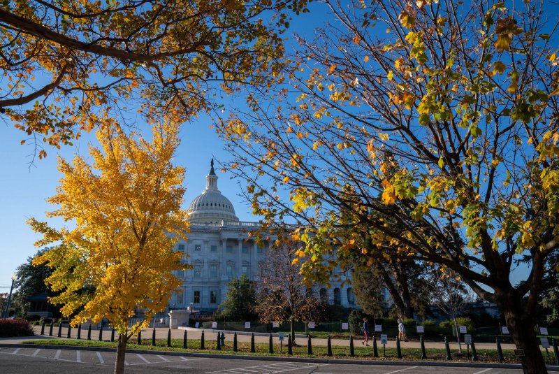 The U.S. Capitol is seen through the fall leaves of trees on the Capitol grounds in Washington, DC in 2020. Photo by Ken Cedeno/UPI