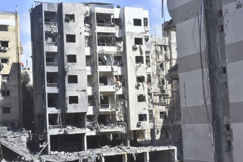 An apartment building stands in partial ruins after being hit by an Israeli airstrike in Beirut's, Lebanon on Monday. The Israeli military said it carried out dozens of strikes in Lebanon last night, including southern Beirut and the Bekaa Valley. Photo by Fadel Itani/UPI