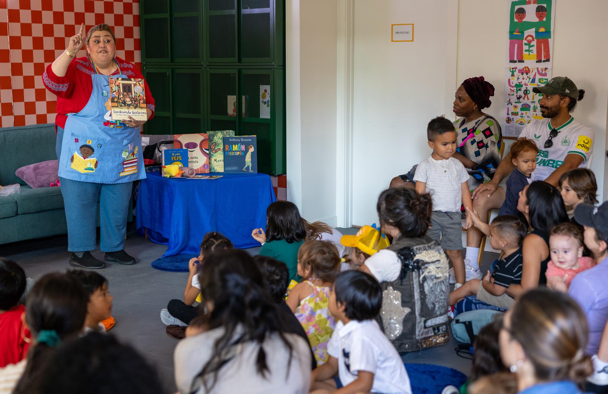 Children listen during story time at a bookstore