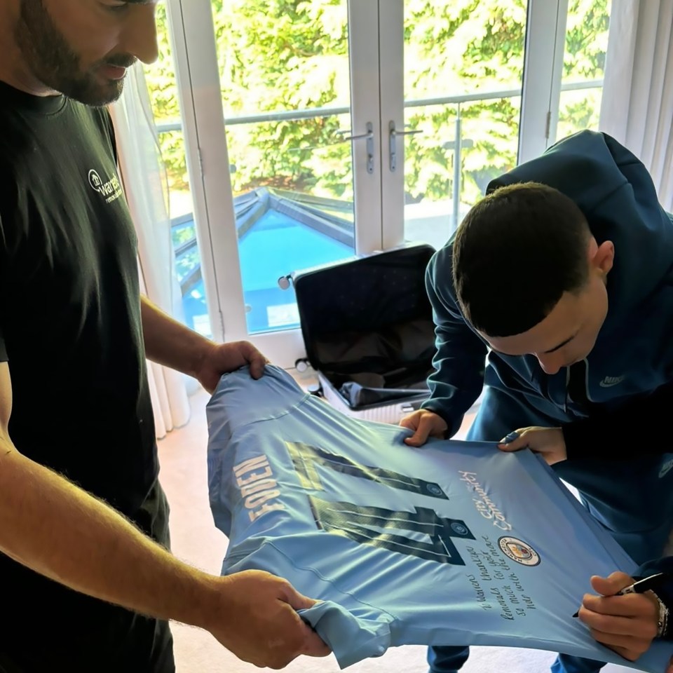 Phil Foden left the removal firm with a signed Man City shirt