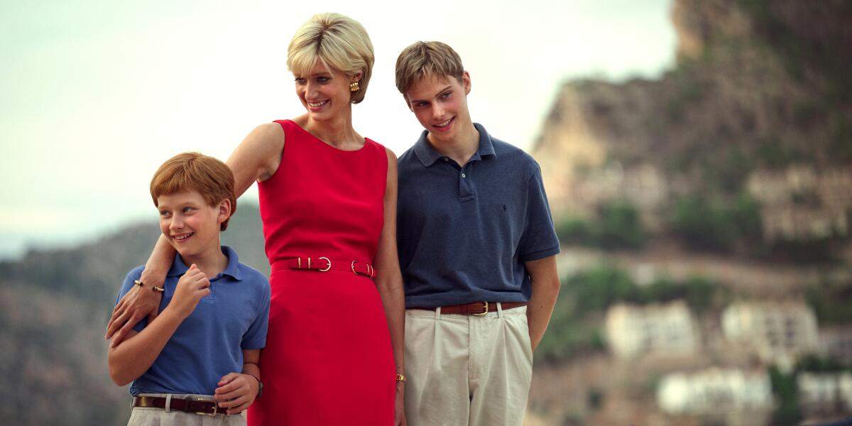 Elizabeth Debicki flanked by Fflyn Edwards and Rufus Kampa outdoors in "The Crown."